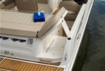 Bayliner VR6 - 2023 Bayliner VR6 boat with tan seating and wooden deck details.