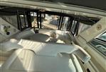 Sea Ray 500 - Interior of 1995 Sea Ray 500 yacht with white seating and panoramic windows.