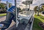 Pathfinder 2500 Hybrid - 2019 Pathfinder 2500 Hybrid boat with Yamaha engine, parked on a sunny street.