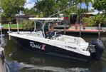 Wellcraft 262 Fisherman - 2021 Wellcraft 262 Fisherman boat named Rosie II docked in a canal.