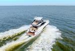 Fairline Squadron 58 - Fairline-58-motor-yacht-for-sale-exterior-image-Lengers-Yachts-6-scaled.jpg