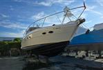 Neptunus 5616 - Neptunus 5616 yacht from 2000 on dry dock under a clear blue sky.