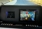 Axopar 28 CABIN - 2023 Axopar 28 CABIN dashboard with Simrad navigation display.