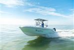 Bayliner Trophy 22 CC - 2024 Bayliner Trophy 22 CC boat cruising on calm water.