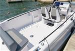 Axopar 22 Spyder - 2021 Axopar 22 Spyder boat interior with dual seats and spacious deck.