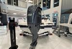 Chaparral 23 SSi OB - 2024 Chaparral 23 SSi OB boat with Yamaha 200 outboard engine in showroom.