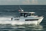 Jeanneau NC Sport 895 - 2024 Jeanneau NC Sport 895 cruising swiftly on open water.