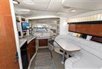 Sea Ray 340 Sundancer - Luxurious interior of 2002 Sea Ray 340 Sundancer yacht with cozy seating and modern amenities.