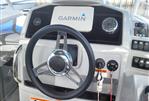 Jeanneau Leader 7.5 WA - Steering console of 2021 Jeanneau Leader 7.5 WA with Garmin navigation system.