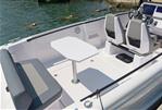 Axopar 22 Spyder - 2021 Axopar 22 Spyder boat interior with seating and table.