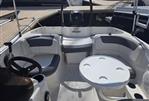 Bayliner Element 16 - 2020 Bayliner Element 16 boat interior with seating and round table.