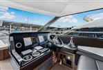 Prestige 590 flybridge - 2024 Prestige 590 Flybridge yacht helm with advanced navigation systems and luxurious seating.