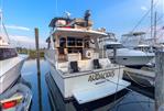 Southern Cross 53 - Southern Cross 53 yacht, 1986 model, docked in a marina with clear skies.