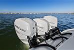 Yellowfin 36 Offshore - 2016 Yellowfin 36 Offshore boat with triple Mercury outboard engines on the water.