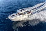 Jeanneau NC 795 S2 - 2025 Jeanneau NC 795 S2 cruising on open water, showcasing sleek design and performance.