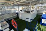 CUSTOM CATAMARAN HUISBOOT