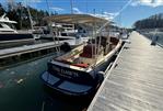 Hinckley Talaria 29C - Hinckley Talaria 29C 2013 docked, featuring "The Dawn" name, sunny marina setting.