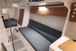 M.A.T. 1070 - 2024 M.A.T. 1070 yacht interior with modern seating and wooden accents.