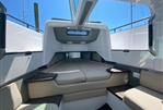 Axopar 37 XC - Interior cabin of 2020 Axopar 37 XC boat with seating and bed.