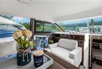 Prestige 520 - Luxurious 2024 Prestige 520 yacht interior with elegant seating and decor.