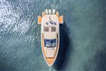 Jeanneau DB43 - Aerial view of 2023 Jeanneau DB43 yacht on clear water.