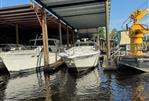 Sea Ray 500 - 1995 Sea Ray 500 docked under a covered marina.