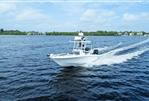 Crevalle 26 HBW - 2022 Crevalle 26 HBW boat cruising on open water under a clear sky.