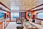 Johnson Flybridge Motor Yacht - Salon Looking Aft    