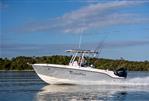 Bayliner Trophy 24 CC - 2024 Bayliner Trophy 24 CC boat cruising on calm water.