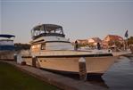 Cytra Bavaria 40 - 1986 Cytra Bavaria 40 yacht docked at a marina during sunset.