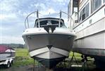 Chaparral 275 SSi - 2007 Chaparral 275 SSi boat on stands, side view, cloudy sky background.