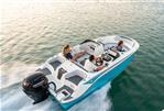 Bayliner M17 - 2024 Bayliner M17 boat cruising on water with passengers.