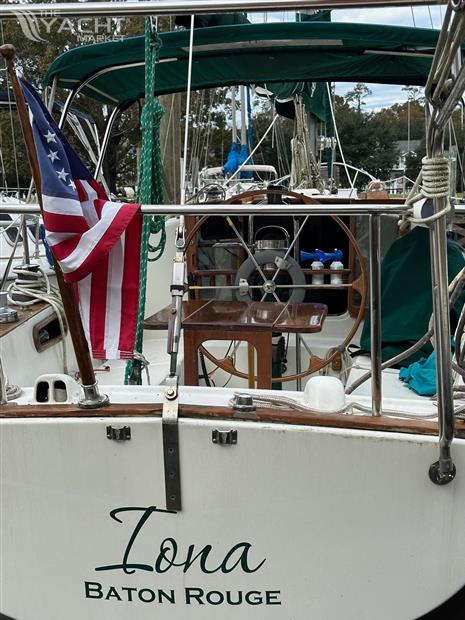 Pearson 35 - 1971 Pearson 35 sailboat &quot;Iona&quot; with American flag, docked in Baton Rouge.