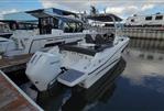 Jeanneau Leader 7.5 WA - 2021 Jeanneau Leader 7.5 WA boat docked in marina, rear view.