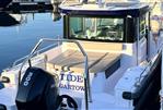 Axopar 28 CABIN - 2023 Axopar 28 CABIN boat docked, featuring a Mercury 300 outboard motor.