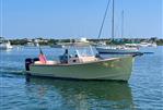 Padebco V27 Center Console - 2003 Padebco V27 Center Console boat cruising on a sunny day.