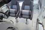 Jeanneau Leader 7.5 WA - 2021 Jeanneau Leader 7.5 WA boat interior with two gray captain chairs.