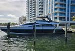 Amer 94 - Luxury Amer 94 yacht docked near modern high-rise buildings, 2017 model.