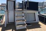 Grand Banks 46 Motoryacht - Aft deck storm door and easy flybridge access
