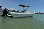 May-Craft 2300CCX - 2017 May-Craft 2300CCX boat on water with Evinrude motor.