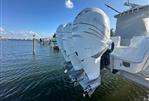 Yellowfin 36 Offshore - 2016 Yellowfin 36 Offshore boat with triple Mercury outboard engines on water.