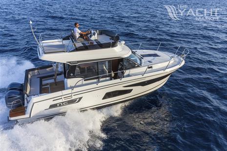 Jeanneau NC 1095 Fly - 2025 Jeanneau NC 1095 Fly cruising on open water, showcasing sleek design and performance.