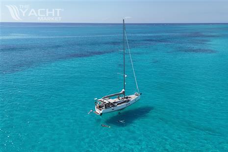 Grand Soleil 47 - Grand Soleil 47 sailboat (2015) anchored in clear turquoise waters.