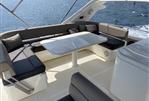 Ferretti 630 - Flybridge sofa with table