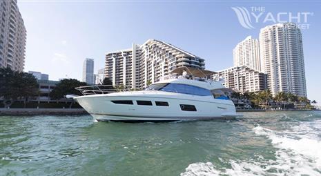 Prestige 550 - Prestige 550 yacht cruising near city skyline, 2014 model.