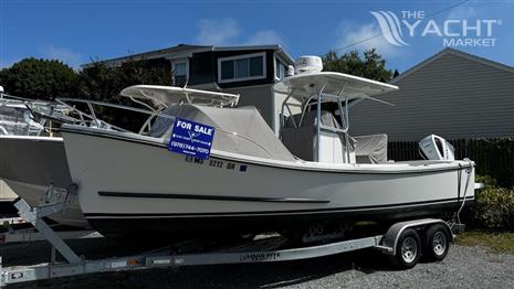 Eastern 248 Center Console - 2021 Eastern 248 Center Console boat for sale on trailer, parked outdoors.