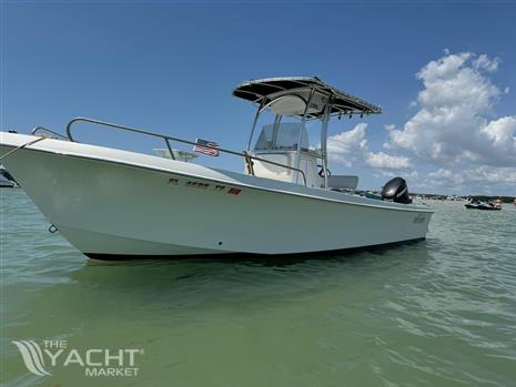 May-Craft 2300CCX - 2017 May-Craft 2300CCX boat on calm water under blue sky.