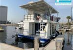 CUSTOM CATAMARAN HUISBOOT