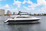 Amer 94 - Luxurious 2017 Amer 94 yacht cruising on a scenic waterfront with city skyline.