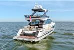 Fairline Squadron 58 - Fairline-58-motor-yacht-for-sale-exterior-image-Lengers-Yachts-24-scaled.jpg